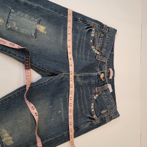 Levi's Limited Edition Distressed Patched Embroidered Boot Cut Jean  Size 9 (34) - Picture 17 of 17